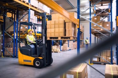 forklift in a factory warehouse shopfloor that is overburdened, one of the 3Ms of muda mura muri