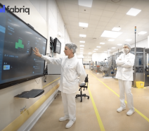 Shop floor team using digital shop floor management tool.