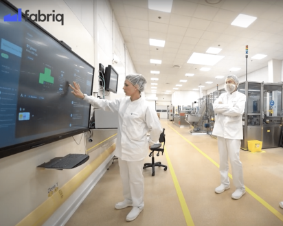 Shop floor team using digital shop floor management tool.