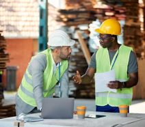 Manufacturers on the factory floor implementing a Continuous Improvement Model